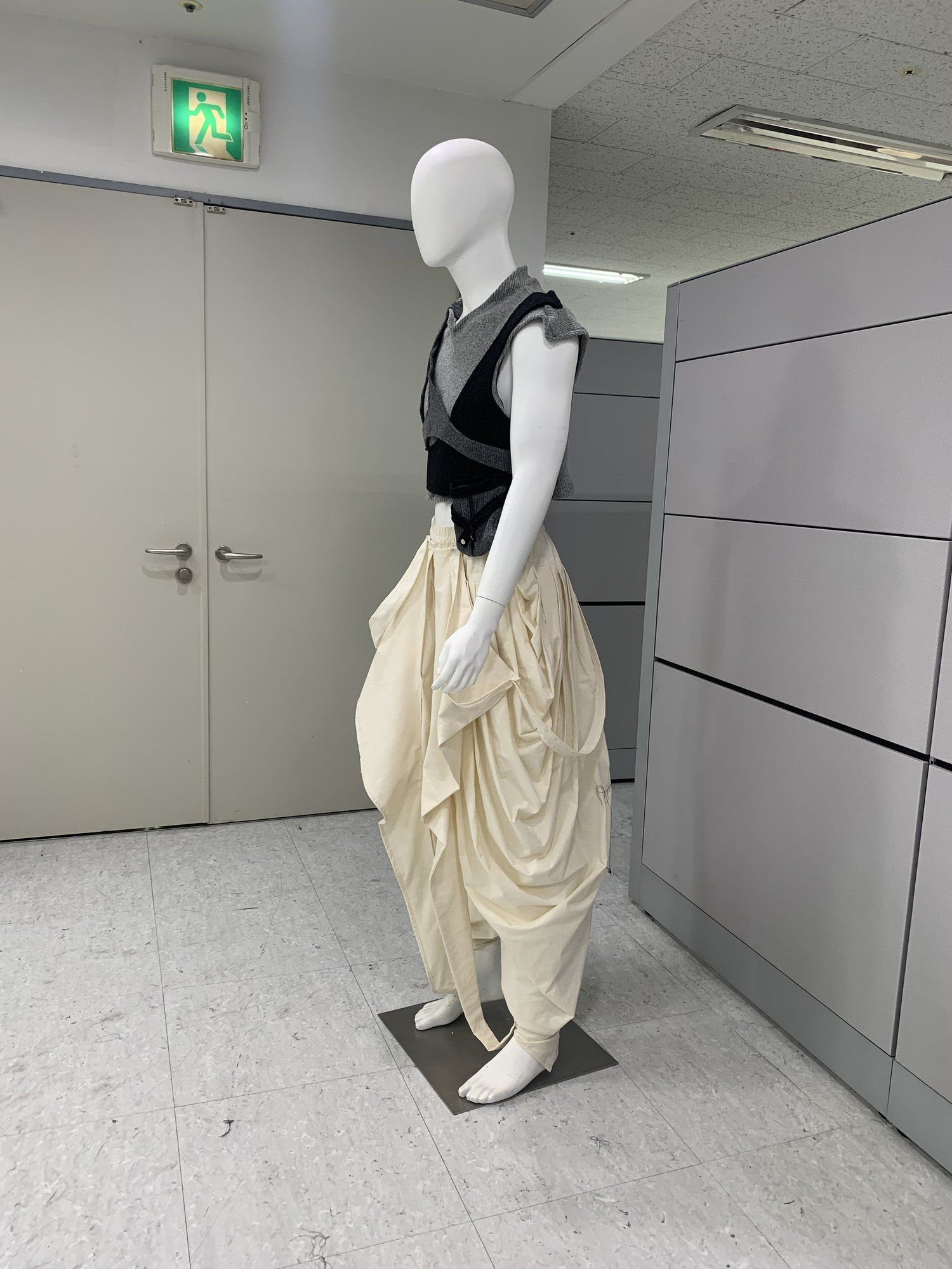 Calico draped skirt toile with a black knit top
