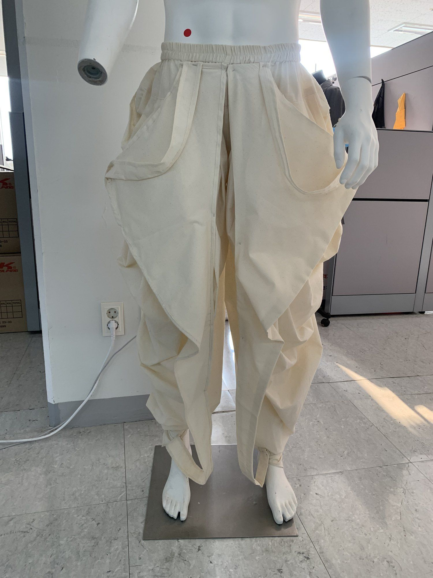 Calico toile of a harem pant on a mannequin