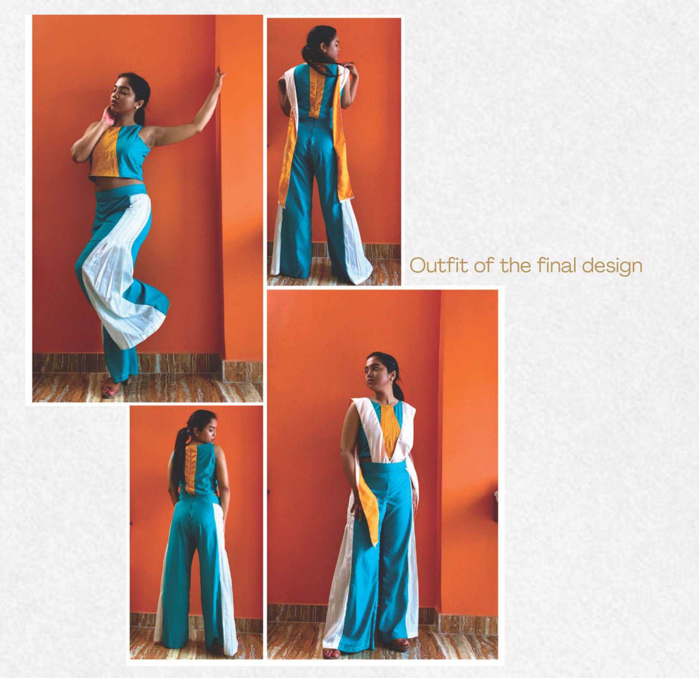 Etosha wearing the outfit she made for Archiplex: teal and white wide trousers with an orange and teal top, against an orange wall